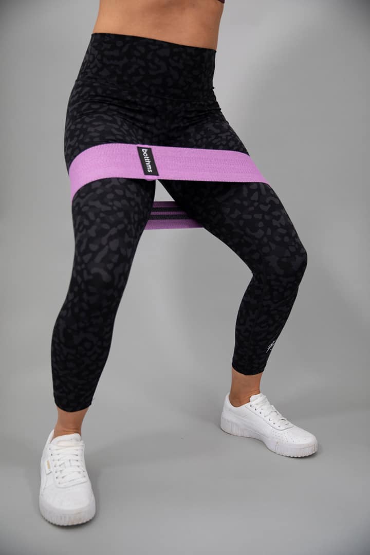 person doing workout with botthms hip resistance band