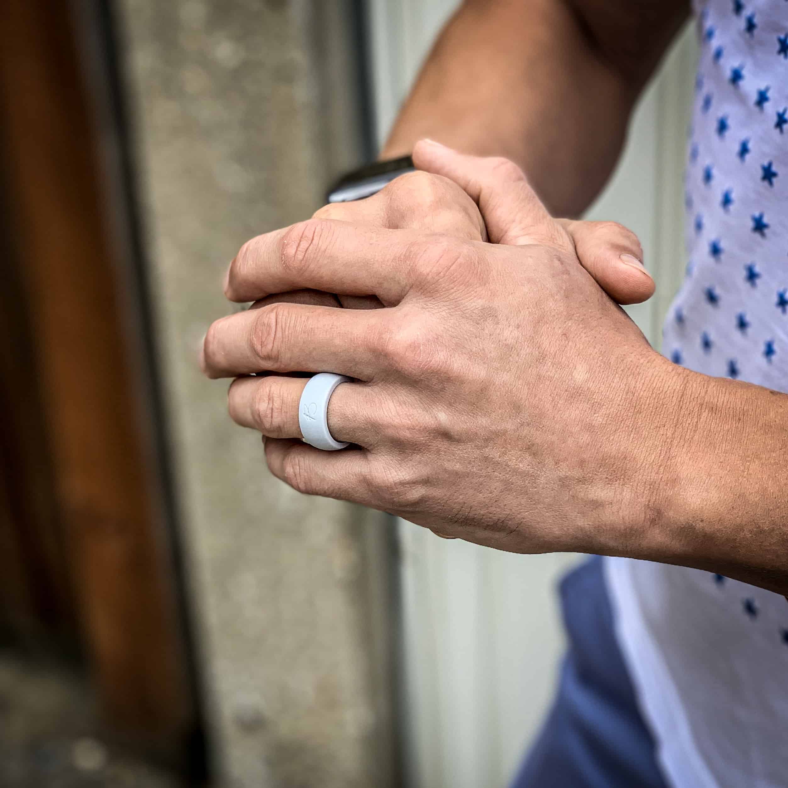 man wearing botthms white active silicone ring