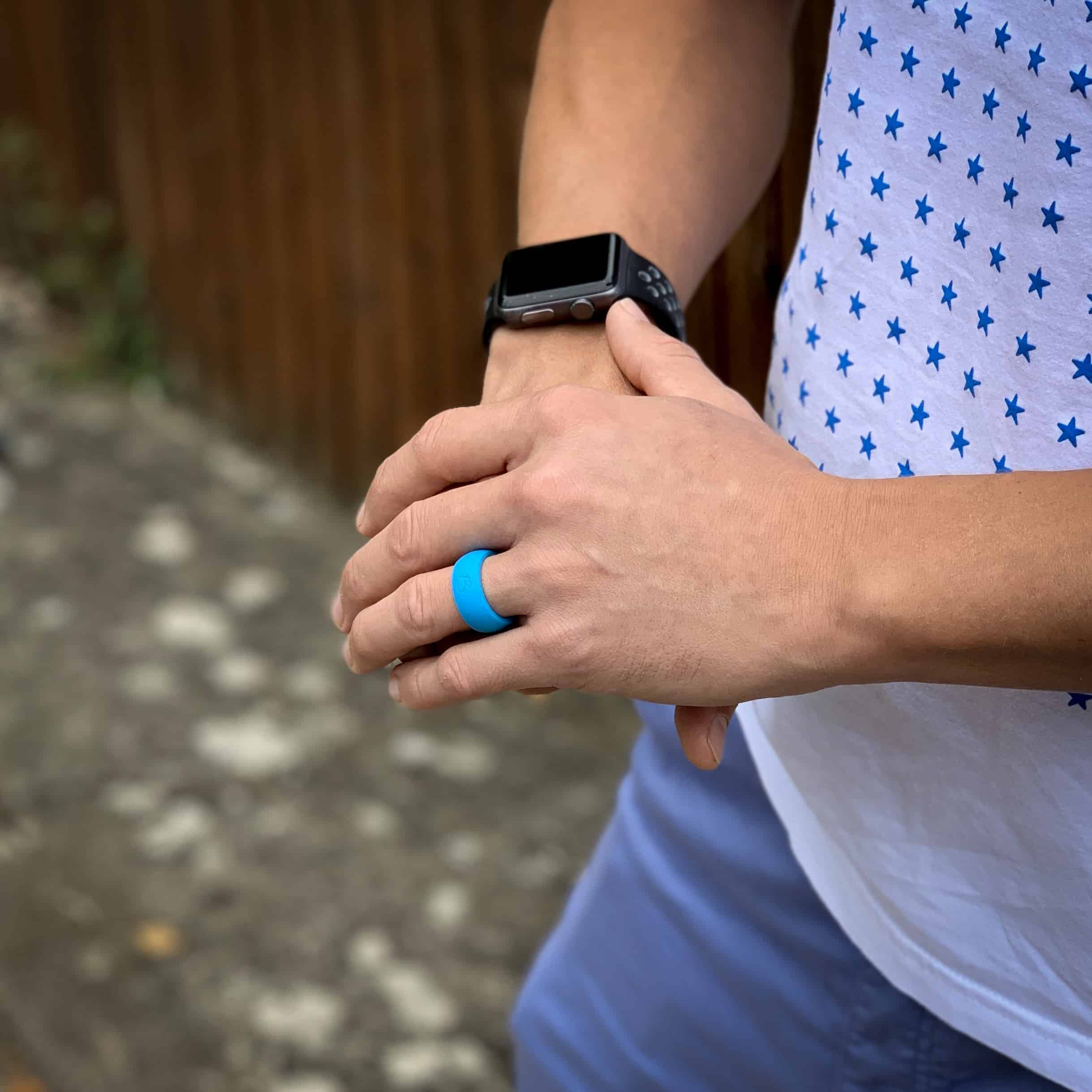 man wearing botthms turquoise active silicone ring