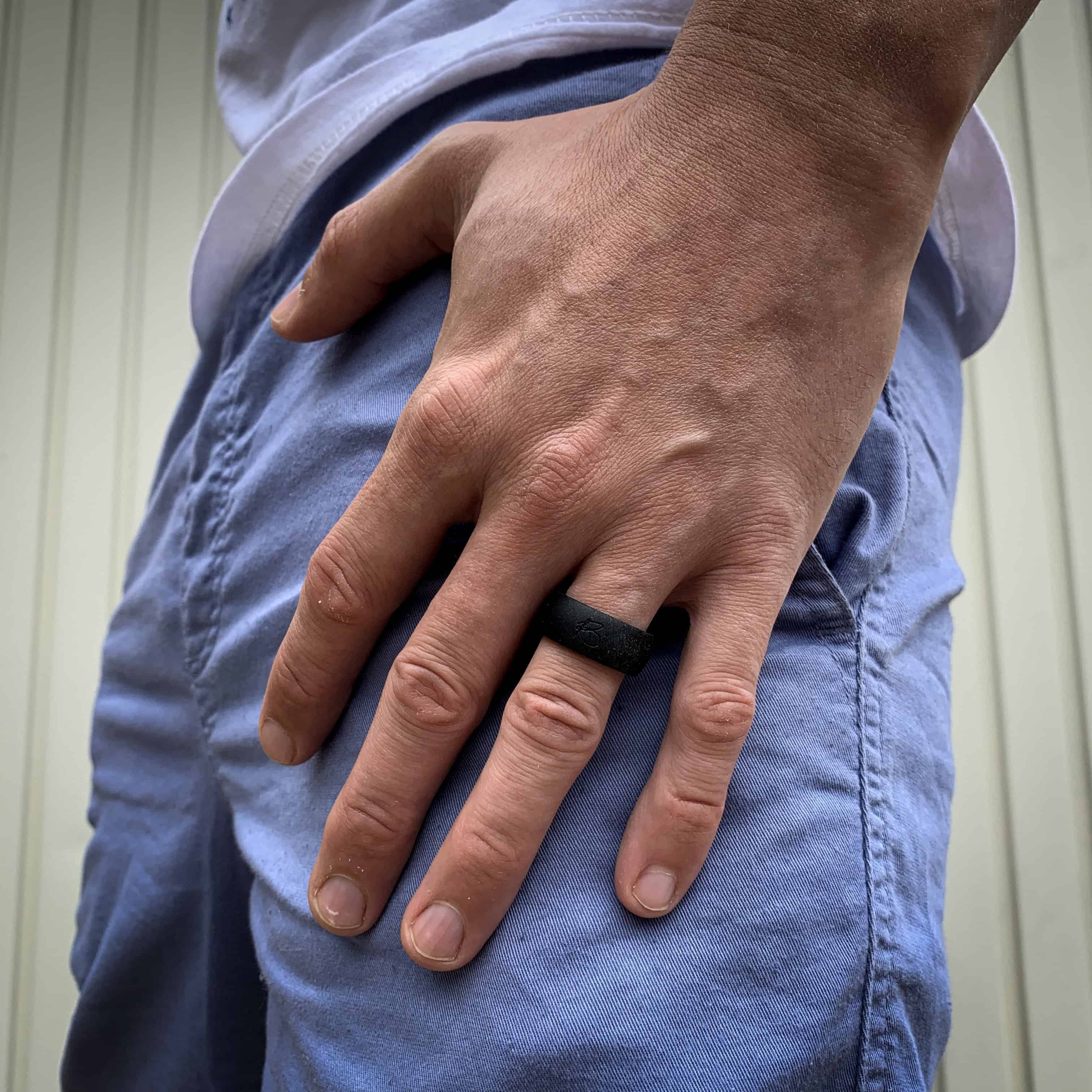 man wearing botthms black active silicone ring