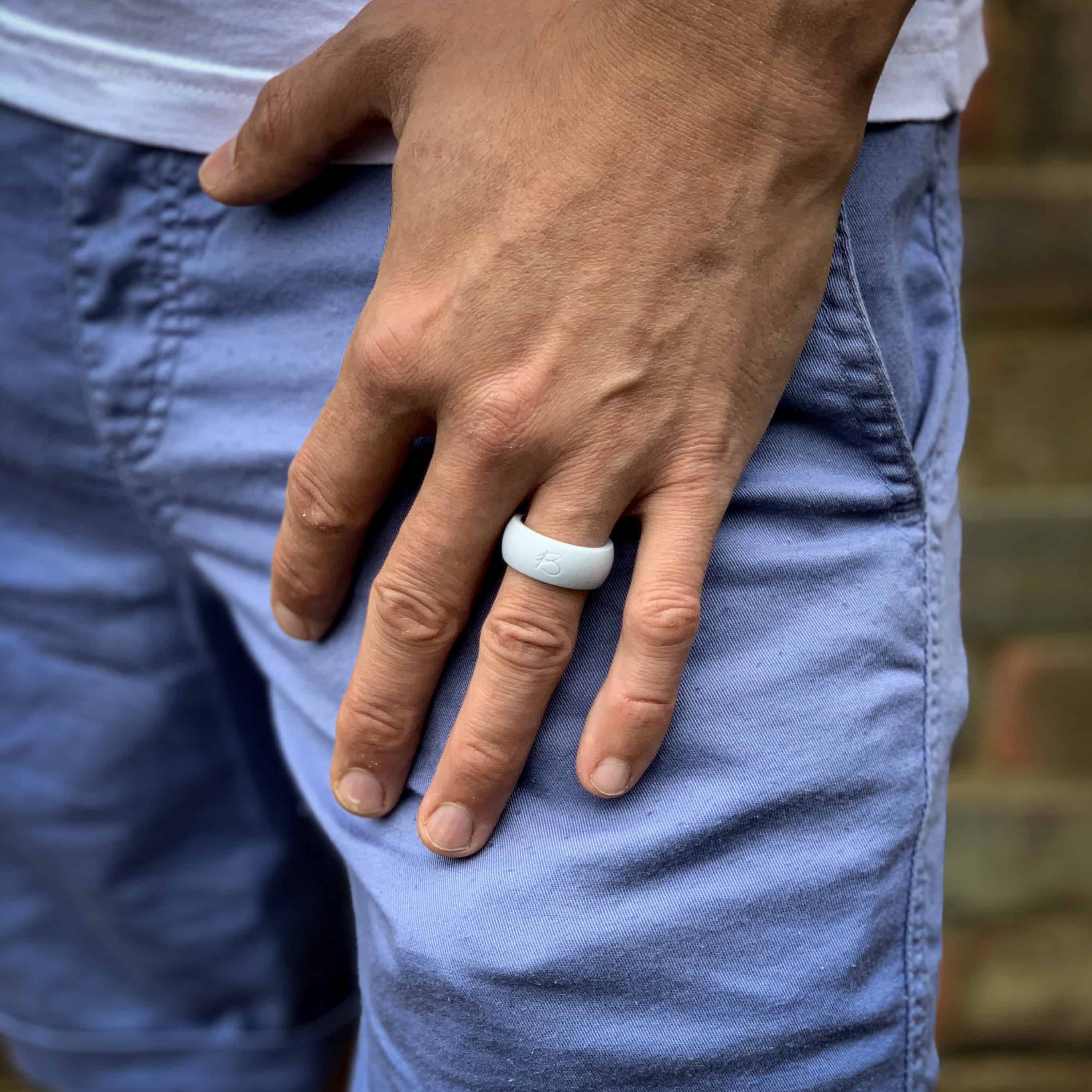 man wearing botthms white active silicone ring
