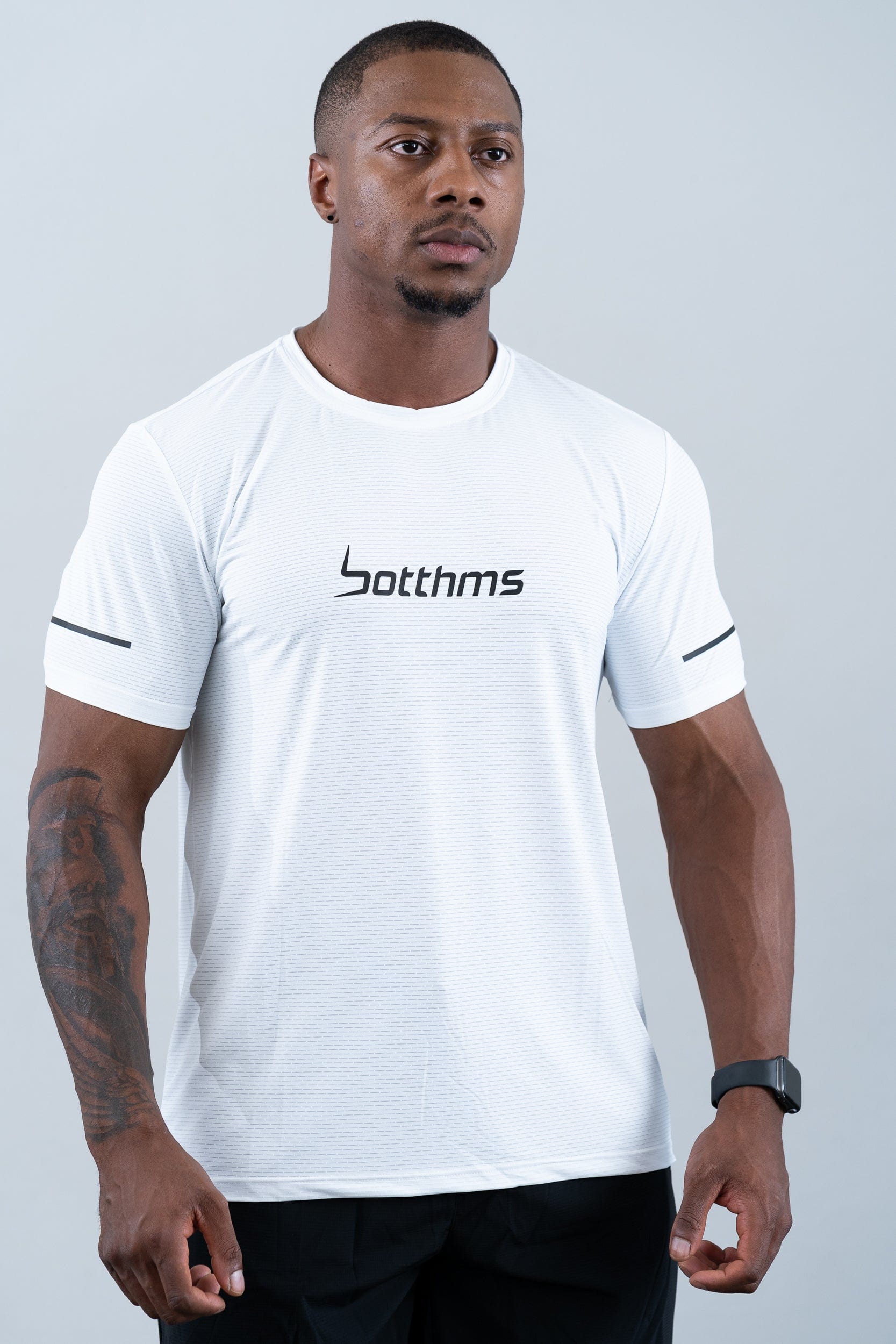 athlete wearing botthms white sport t-shirt - angled front view