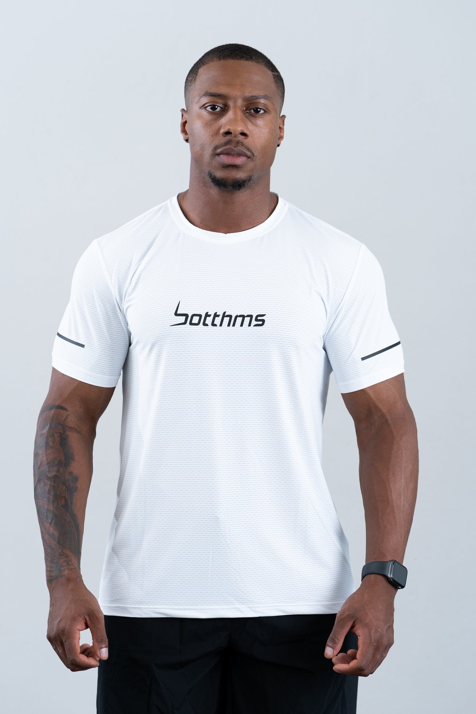 athlete wearing botthms white sport t-shirt - clear front view