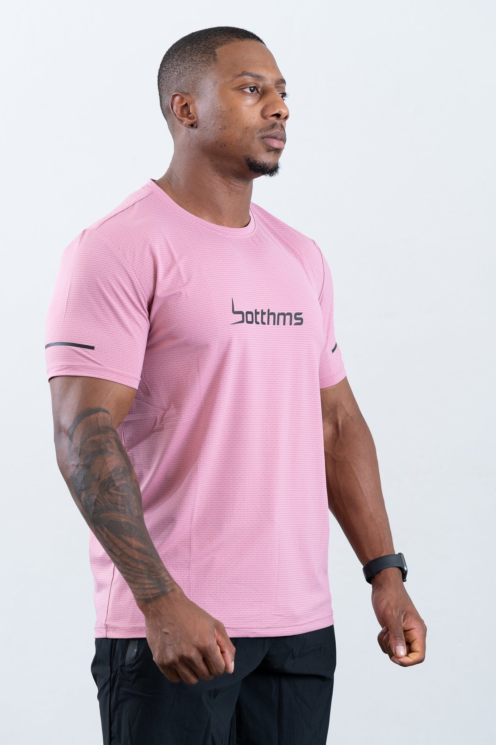 athlete wearing botthms pink sport t-shirt- right view