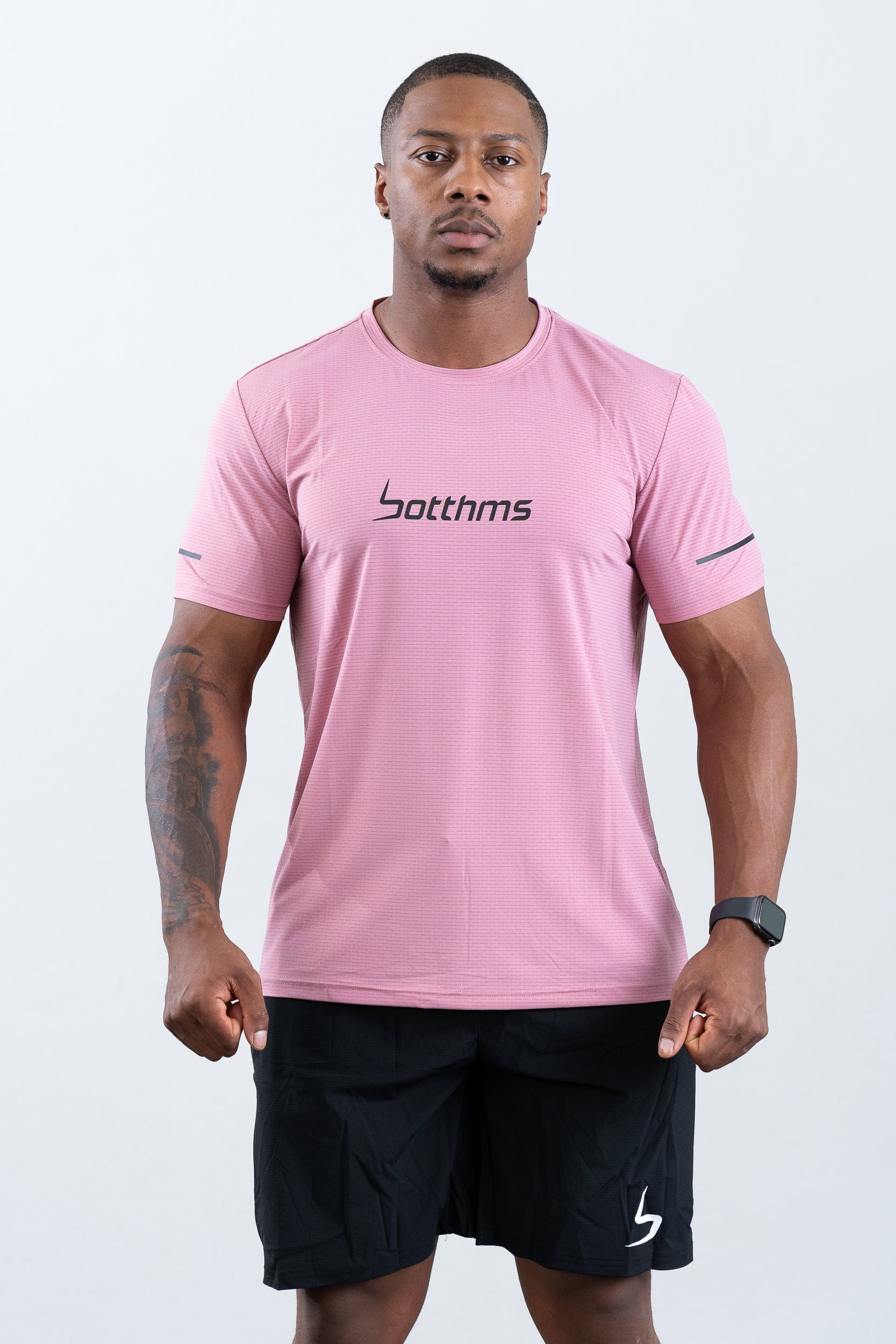 athlete wearing botthms pink sport t-shirt - straight front facing view