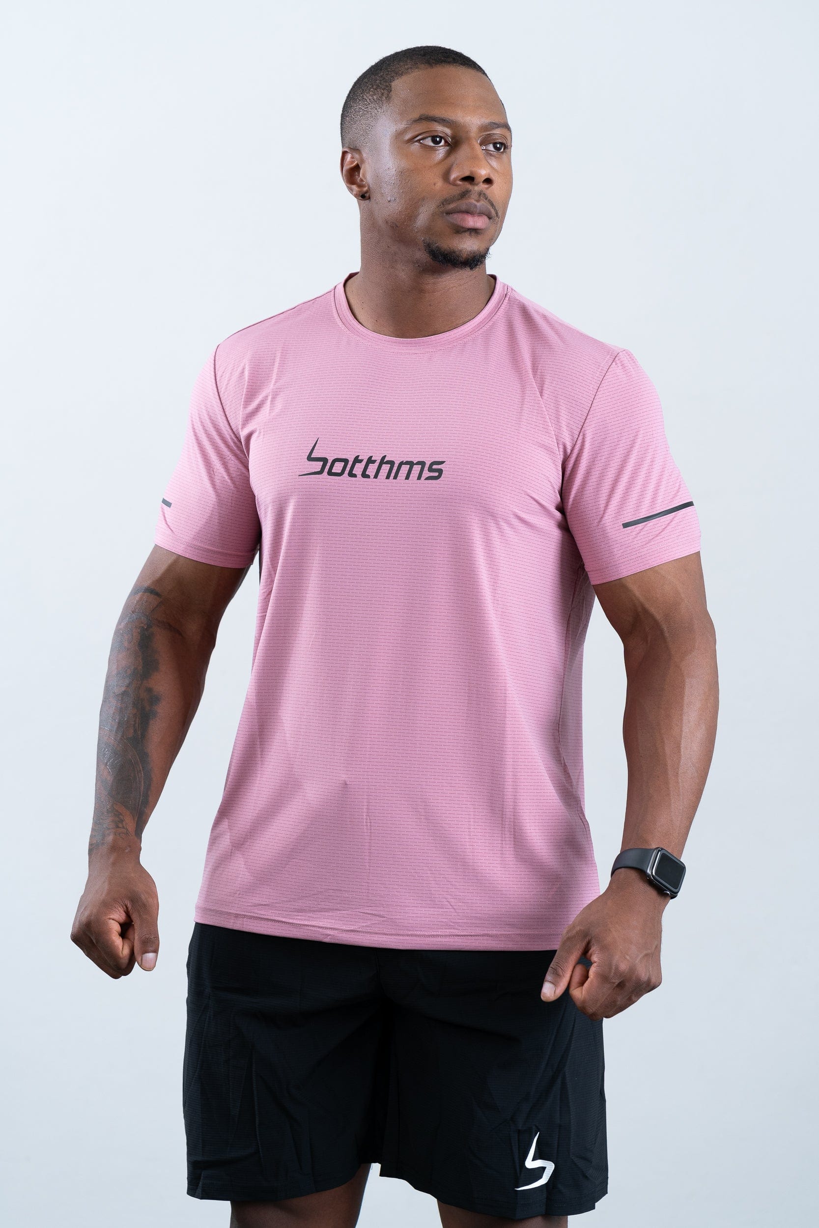 athlete wearing botthms pink sport t-shirt- front view